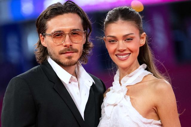 British personality Brooklyn Beckham (L) and US model Nicola Peltz (R) pose on the red carpet during the 52nd edition of the Deauville American film festival, in Deauville, northwestern France on September 8, 2026. (Photo by Guillaume SALIGOT / AFP)