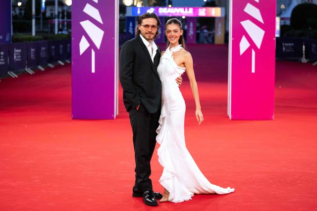 British personality Brooklyn Beckham (L) and US model Nicola Peltz (R) pose on the red carpet during the 52nd edition of the Deauville American film festival, in Deauville, northwestern France on September 8, 2026. (Photo by Guillaume SALIGOT / AFP)