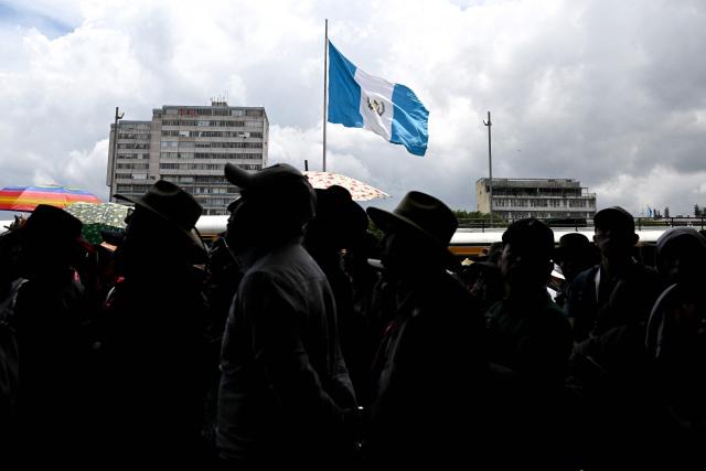 Indigenous people attend a rally against fuel prices outside the Palace of Culture in Guatemala City on September 8, 2026. (Photo by Johan ORDONEZ / AFP)