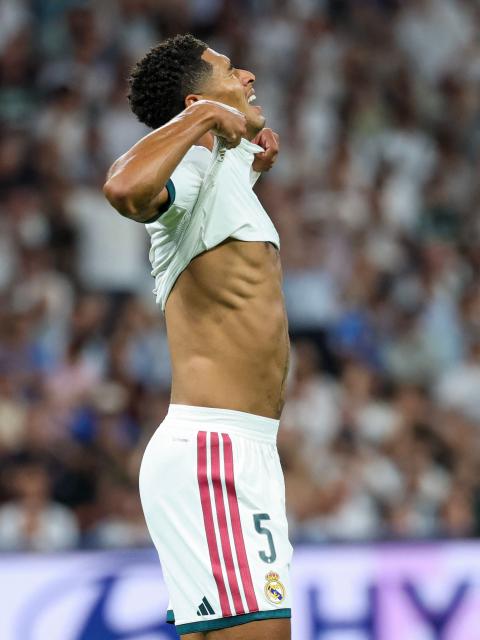 Real Madrid's English midfielder #05 Jude Bellingham reacts after missing a chance to score during the UEFA Champions League first round day 1 football match between Real Madrid and Inter Milan at the Santiago Bernabeu stadium in Madrid on September 8, 2026. (Photo by Thomas COEX / AFP)