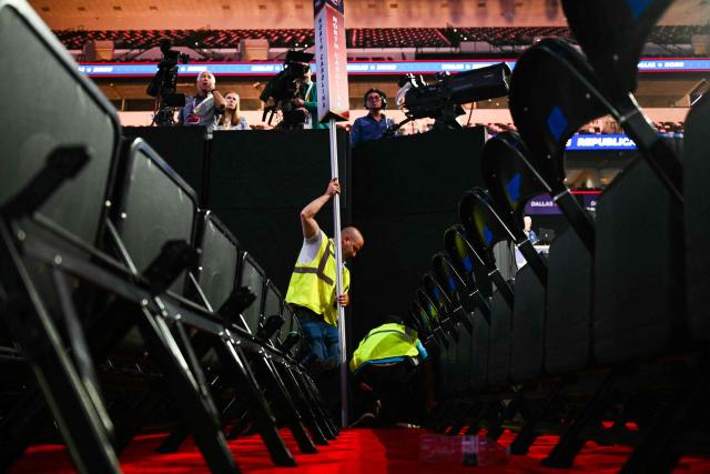Workers prepare the American Airlines Center ahead of the Republican National Committee (RNC) Midterm Convention in Dallas, Texas on September 8, 2026. The convention, announced by Trump as the first national Republican gathering held during a midterm election year, is expected to draw the president alongside Vice President JD Vance and other Republican leaders as the party looks to rally voters ahead of a hard-fought battle for control of Congress in November. (Photo by Kent NISHIMURA / AFP)