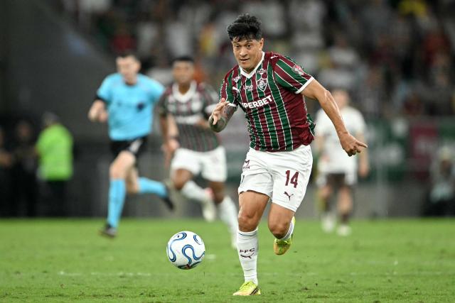 Fluminense's Argentine forward #14 German Cano runs for the ball during the Copa Libertadores quarter-final first leg football match between Brazil's Fluminense and Argentina's Platense at the Maracana stadium in Rio de Janeiro, Brazil on September 8, 2026. (Photo by MAURO PIMENTEL / AFP)