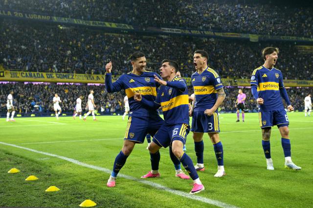 Boca Juniors' Uruguayan forward #16 Miguel Merentiel (2nd L) celebrates with teammates midfielder #05 Leandro Paredes (L), defender #03 Lautaro Blanco and midfielder #08 Tomas Belmonte after scoring a goal during the Copa Sudamericana quarter-final first leg football match between Argentina's Boca Juniors and Brazil's Sao Paulo at La Bombonera stadium in Buenos Aires on September 8, 2026. (Photo by JUAN MABROMATA / AFP)