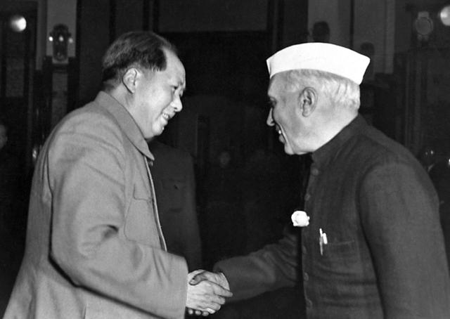(FILES) Indian prime minister Pandit Jawaharlal Nehru, in official visit in China, shakes hands with Chinese president Mao Zedong, 12 October 1954 in Beijing. The Great Helmsman, who died September 9, 1976, is still very much a fixture in central Henan province's Nanjie -- often dubbed "China's last Maoist village".
Nostalgia for Mao's egalitarian ideals is growing in China as memories of his turbulent rule fade. (Photo by INTERCONTINENTALE / AFP)