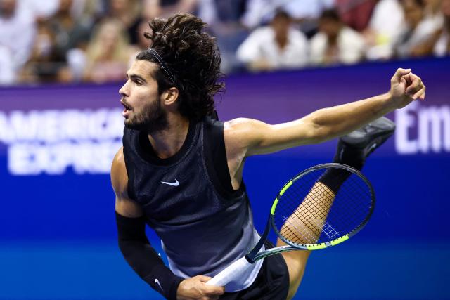 Spain's Carlos Alcaraz serves against USA's Ben Shelton during the men's singles quarter-final tennis match on day ten of the US Open tennis tournament at the USTA Billie Jean King National Tennis Center in New York City on September 8, 2026. (Photo by CHARLY TRIBALLEAU / AFP)