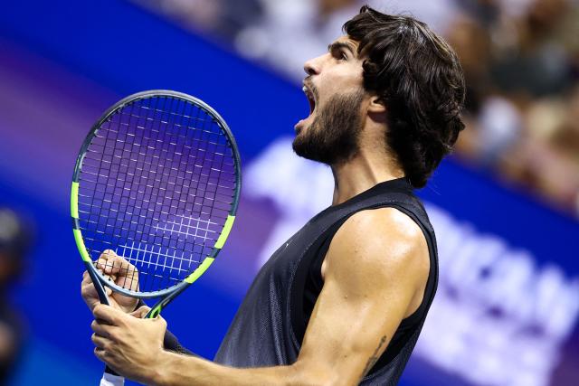 Spain's Carlos Alcaraz reacts after a point against USA's Ben Shelton during the men's singles quarter-final tennis match on day ten of the US Open tennis tournament at the USTA Billie Jean King National Tennis Center in New York City on September 8, 2026. (Photo by CHARLY TRIBALLEAU / AFP)