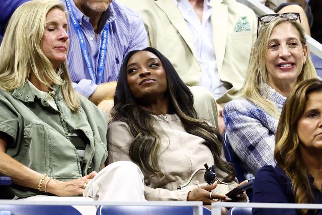 US gymnast Simone Biles watches the the men's singles quarter-final tennis match between Spain's Carlos Alcaraz and USA's Ben Shelton on day ten of the US Open tennis tournament at the USTA Billie Jean King National Tennis Center in New York City on September 8, 2026. (Photo by CHARLY TRIBALLEAU / AFP)