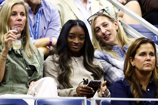 US gymnast Simone Biles watches the the men's singles quarter-final tennis match between Spain's Carlos Alcaraz and USA's Ben Shelton on day ten of the US Open tennis tournament at the USTA Billie Jean King National Tennis Center in New York City on September 8, 2026. (Photo by CHARLY TRIBALLEAU / AFP)