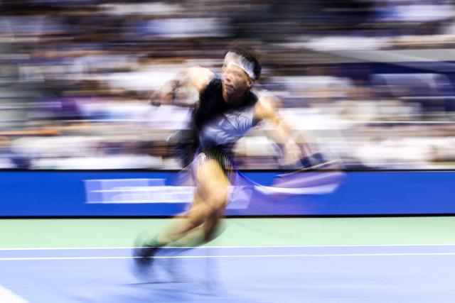 USA's Ben Shelton hits a return against Spain's Carlos Alcaraz during the men's singles quarter-final tennis match on day ten of the US Open tennis tournament at the USTA Billie Jean King National Tennis Center in New York City on September 8, 2026. (Photo by CHARLY TRIBALLEAU / AFP)