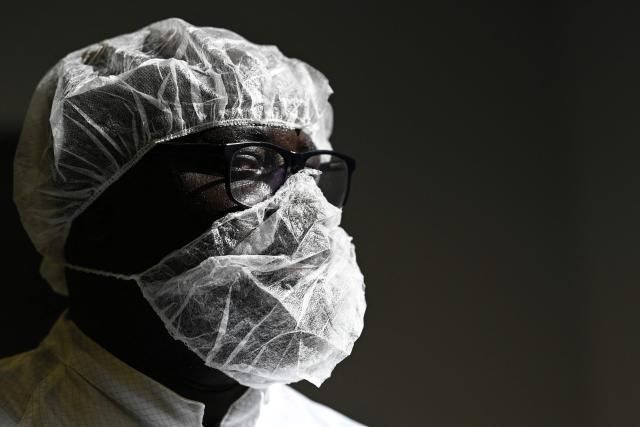 Senegalese Professor Gayane Faye, doctor in spatial remote sensing and coordinator of the development of Senegal's satellites poses as he works on the satellite Gaindesat-1B at the CSUM (Space University Center of Montpellier) in Montpellier, southern France, on September 4, 2026. Gaindesat-1B is designed to build on Senegal's first satellite, Gaindesat-1A, launched from California in 2024, and will collect environmental data and imagery to support natural resource management, territorial monitoring and climate observation. (Photo by Gabriel BOUYS / AFP)