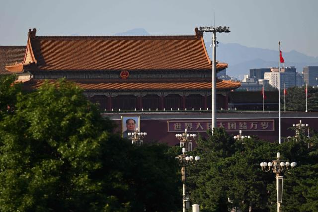 The portrait of China’s late Communist leader Mao Zedong which hangs on Tiananmen Gate is seen on the 50th anniversary of his death in Beijing on September 9, 2026. (Photo by GREG BAKER / AFP)