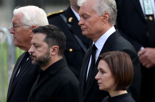 (L-R) German President Frank-Walter Steinmeier, Ukraine's President Volodymyr Zelensky, Lithuania's President Gitanas Nauseda and Moldova's President Maia Sandu arrive at the church as they walk during the royal procession accompanying the casket of late King Harald V of Norway from the Royal Palace Chapel to the Cathedral in Oslo, Norway, on September 9, 2026. Harald, who died on August 28, 2026 at the age of 89, will be laid to rest in the crypt of the royal mausoleum of Akershus Castle, a medieval fortress overlooking Oslo Fjord, after a service at the Oslo Cathedral. (Photo by Odd ANDERSEN / AFP)