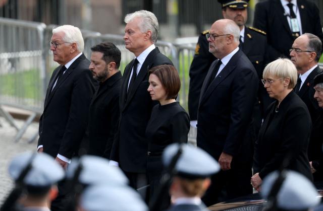 (L-R) German President Frank-Walter Steinmeier, Ukraine's President Volodymyr Zelensky, Lithuania's President Gitanas Nauseda, Moldova's President Maia Sandu and Estonia's President Alar Karis arrive at the church as they walk during the royal procession accompanying the casket of late King Harald V of Norway from the Royal Palace Chapel to the Cathedral in Oslo, Norway, on September 9, 2026. Harald, who died on August 28, 2026 at the age of 89, will be laid to rest in the crypt of the royal mausoleum of Akershus Castle, a medieval fortress overlooking Oslo Fjord, after a service at the Oslo Cathedral. (Photo by Odd ANDERSEN / AFP)