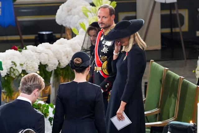 King Haakon VIII of Norway (top), Queen Mette-Marit of Norway (R) and Queen Sonja of Norway (back L) take their seats to attend the funeral service for Norway's late King Harald V at the Oslo Cathedral in Oslo, Norway, on September 9, 2026. Harald, who died on August 28, 2026 at the age of 89, will be laid to rest in the crypt of the royal mausoleum of Akershus Castle, a medieval fortress overlooking Oslo Fjord, after a service at the Oslo Cathedral. (Photo by Lise Åserud / POOL / AFP)