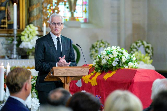 Norway's Prime Minister Jonas Gahr Støre speaks near the coffin of King Haakon VIII of Norway as the royal family and guets sit during the funeral service for Norway's late King at the Oslo Cathedral in Oslo, Norway, on September 9, 2026. Harald, who died on August 28, 2026 at the age of 89, will be laid to rest in the crypt of the royal mausoleum of Akershus Castle, a medieval fortress overlooking Oslo Fjord, after a service at the Oslo Cathedral. (Photo by Stian Lysberg Solum / POOL / AFP)