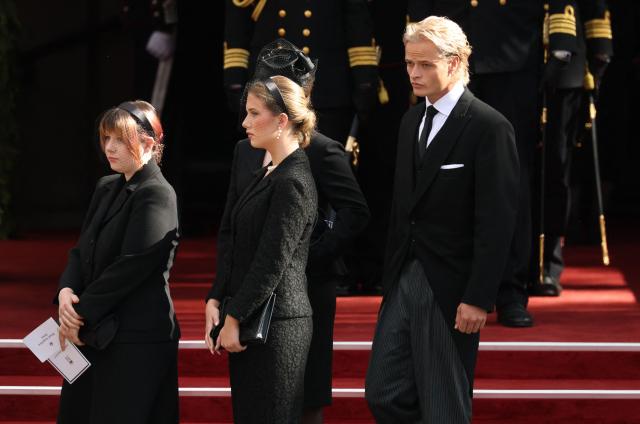 The son of Queen Mette-Marit of Norway Marius Borg Hoiby (R) and Maud Angelica Behn (L) and Emma Tallulah Behn, daughters of Princess Märtha Louise of Norway, leave after the funeral service for late King Harald V of Norway before the casket is moved in a procession from Oslo Cathedral to Akershus Castle in Oslo, Norway, on September 9, 2026. (Photo by Odd ANDERSEN / AFP)