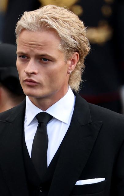The son of Queen Mette-Marit of Norway Marius Borg Hoiby leaves the church at the end of the funeral service for Norway's late King Harald V at the Oslo Cathedral in Oslo, Norway, on September 9, 2026. Harald, who died on August 28, 2026 at the age of 89, will be laid to rest in the crypt of the royal mausoleum of Akershus Castle, a medieval fortress overlooking Oslo Fjord, after a service at the Oslo Cathedral. (Photo by Odd ANDERSEN / AFP)