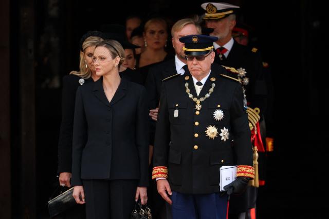 Prince Albert II of Monaco, Charlene of Monaco and other guests leave after the funeral service for late King Harald V of Norway before the casket is moved in a procession from Oslo Cathedral to Akershus Castle in Oslo, Norway, on September 9, 2026. (Photo by Odd ANDERSEN / AFP)