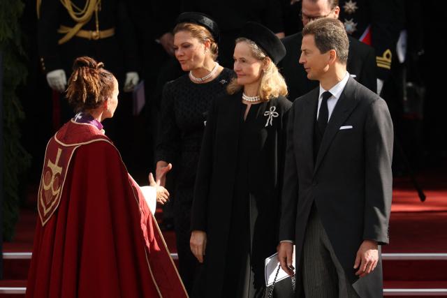 The bishop of Oslo Sunniva Gylver greets Crown Princess Victoria of Sweden, Hereditary Prince Alois of Liechtenstein and Hereditary Princess Sophie of Liechtenstein as they leave the church after the state funeral for late King Harald V of Norway at the Cathedral in Oslo, Norway, on September 9, 2026. Harald, who died on August 28, 2026 at the age of 89, will be laid to rest in the crypt of the royal mausoleum of Akershus Castle, a medieval fortress overlooking Oslo Fjord, after a service at the Oslo Cathedral. (Photo by Odd ANDERSEN / AFP)