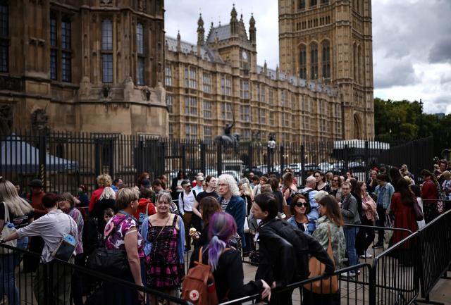 People queue to enter the Houses of Parliament in central London on September 9, 2026, to lobby MPs for trans rights and call on the government to scrap new changes to the Equality and Human Rights Commission’s (EHRC) revised 'Code of Practice'. (Photo by Henry NICHOLLS / AFP)