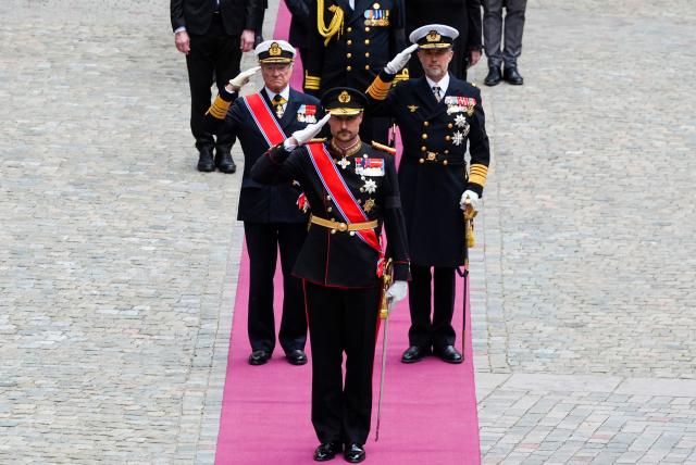King Haakon VIII (C) of Norway, King Carl XVI Gustaf of Sweden (L) and King Frederik X of Denmark (R) greet the coffin of Norway's late King Harald V as it is taken to the royal mausoleum in the crypt at Akershus Castle after the funeral ceremony at Oslo Cathedral, on September 9, 2026 in Oslo. Harald, who died on August 28, 2026 at the age of 89, will be laid to rest in the crypt of the royal mausoleum of Akershus Castle, a medieval fortress overlooking Oslo Fjord, after a service at the Oslo Cathedral. (Photo by Terje Pedersen / POOL / AFP)