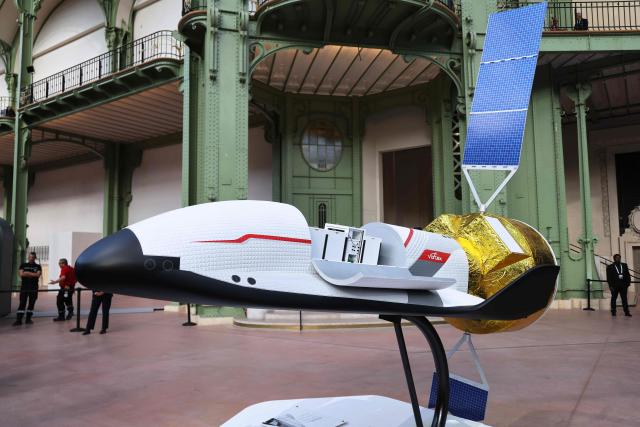 A photo shows a model of a Dassault Vortex space vehicle project during the International Space Summit at the Grand Palais in Paris on September 9, 2026. The two-day International Space Summit brings together nearly 120 delegations to discuss global space governance. (Photo by Ludovic MARIN / POOL / AFP)