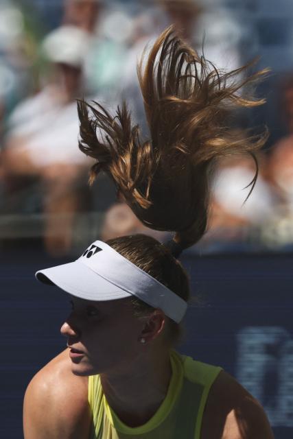Kazakhstan's Elena Rybakina hits a return against China's Zheng Qinwen during their women's singles quarter-final tennis match on day eleven of the US Open tennis tournament at the USTA Billie Jean King National Tennis Center in New York City on September 9, 2026. (Photo by TIMOTHY A. CLARY / AFP)