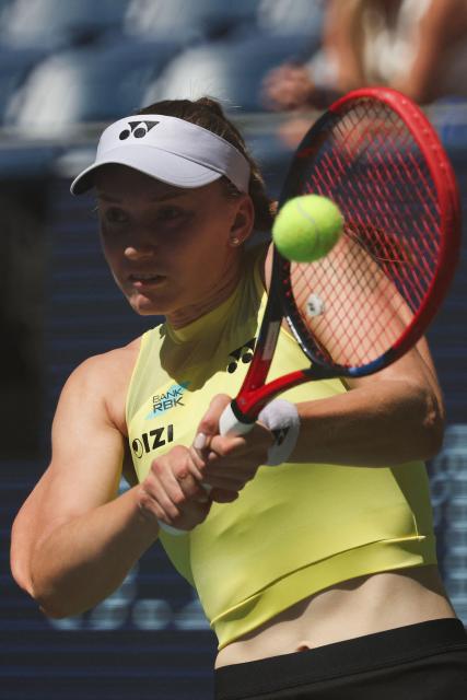 Kazakhstan's Elena Rybakina hits a return against China's Zheng Qinwen during their women's singles quarter-final tennis match on day eleven of the US Open tennis tournament at the USTA Billie Jean King National Tennis Center in New York City on September 9, 2026. (Photo by TIMOTHY A. CLARY / AFP)