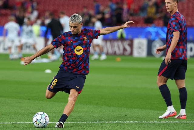 Barcelona's Spanish midfielder #08 Pedri warms up before the UEFA Champions League first round day 1 football match between FC Barcelona and Feyenoord at Camp Nou stadium in Barcelona on September 9, 2026. (Photo by Lluis GENE / AFP)