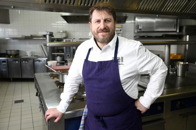 (FILES) French chef Olivier Bellin poses in the kitchen of his restaurant "L'Auberge des Glazicks" on January 25, 2018 in Plomodiern, western France. The Quimper public prosecutor’s office has launched an investigation into allegations of violence and psychological harassment in the workplace against the two-Michelin-starred Breton chef Olivier Bellin, it announced on September 9, 2026. (Photo by FRED TANNEAU / AFP)