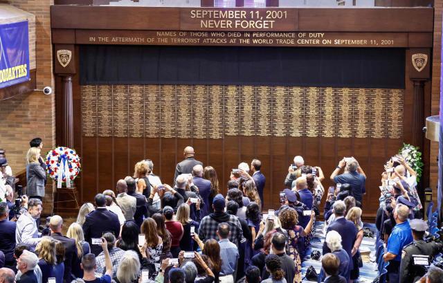 New York City Mayor Zohran Mamdani and New York City Police Commissioner Jessica Tisch (L) stand next to a new 9/11 Memorial Wall at One Police Plaza during a unveiling ceremony in New York, on September 9, 2026. (Photo by kena betancur / AFP)