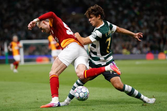 Galatasaray's Turkish forward #53 Baris Alper Yilmaz (L) is challenged by Sporting Lisbon's Portuguese defender #72 Eduardo Quaresma during the UEFA Champions League first round day 1 football match between Sporting CP and Galatasaray at Jose Alvalade stadium in Lisbon on September 9, 2026. (Photo by FILIPE AMORIM / AFP)