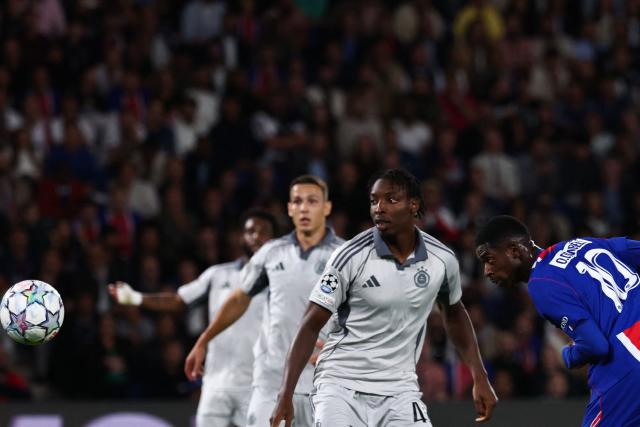 Paris Saint-Germain's French forward #10 Ousmane Dembele (L) heads the ball to score his team second goal during the UEFA Champions League, league phase, matchday 1, football match between Paris Saint-Germain (PSG) and Slovan Bratislava at the Parc des Princes Stadium in Paris on September 9, 2026. (Photo by FRANCK FIFE / AFP)