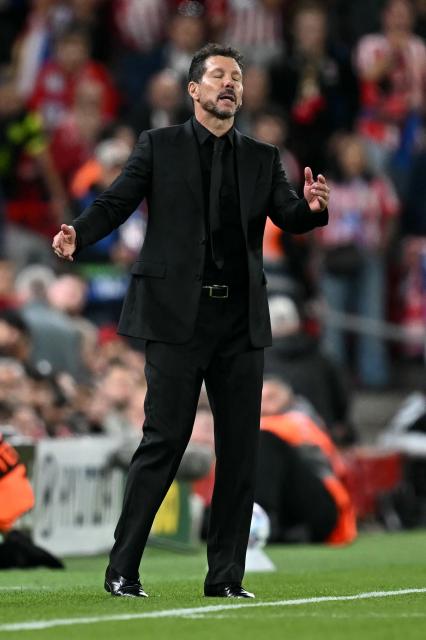 Atletico Madrid's Argentinian coach Diego Simeone reacts during the UEFA Champions League football match between Liverpool and Atletico Madrid at Anfield in Liverpool, north west England on September 9, 2026. (Photo by Paul ELLIS / AFP)