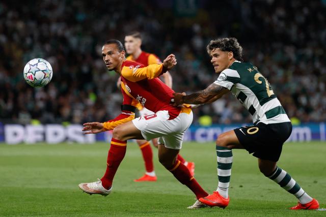 Galatasaray's German forward #10 Leroy Sane (L) vies for the ball with Sporting Lisbon's Uruguayan midfielder #20 Maximiliano Araujo during the UEFA Champions League first round day 1 football match between Sporting CP and Galatasaray at Jose Alvalade stadium in Lisbon on September 9, 2026. (Photo by FILIPE AMORIM / AFP)