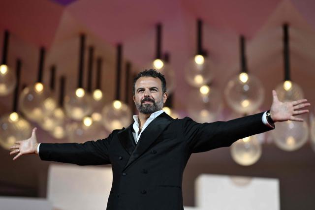 Director Edoardo De Angelis attends the red carpet event for the screening of "Il fuoco che ti porti dentro" (The Fire within you) presented in competition at the 83rd International Venice Film Festival, at Venice Lido on September 9, 2026. (Photo by Tiziana FABI / AFP)