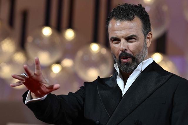 Director Edoardo De Angelis attends the red carpet event for the screening of "Il fuoco che ti porti dentro" (The Fire within you) presented in competition at the 83rd International Venice Film Festival, at Venice Lido on September 9, 2026. (Photo by Tiziana FABI / AFP)