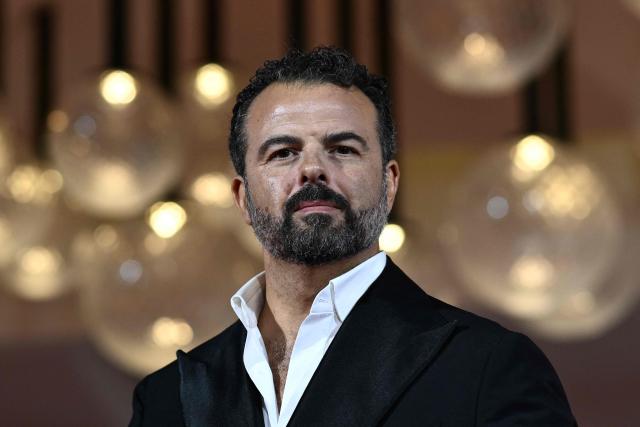 Director Edoardo De Angelis attends the red carpet event for the screening of "Il fuoco che ti porti dentro" (The Fire within you) presented in competition at the 83rd International Venice Film Festival, at Venice Lido on September 9, 2026. (Photo by Tiziana FABI / AFP)