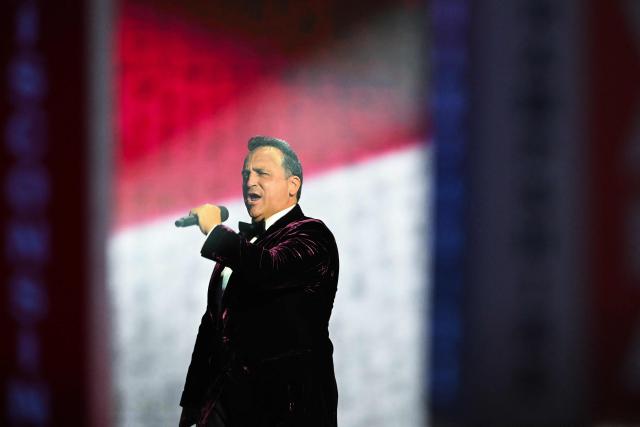 US opera tenor Christopher Macchio sings at the opening of the first day of the Republican National Midterm Convention at the American Airlines Center in Dallas, Texas on September 9, 2026. US Republicans open an extraordinary midterm convention in Dallas on September 9 betting that putting Donald Trump at the center of their campaign can rescue a party facing grim election forecasts -- despite the president's negative approval ratings. (Photo by RONALDO SCHEMIDT / AFP)