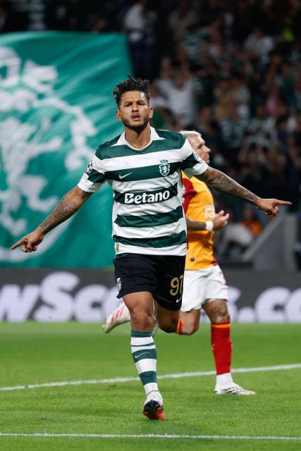 Sporting Lisbon's Colombian forward #97 Luis Suarez (R) celebrates scoring his team's second goal during the UEFA Champions League first round day 1 football match between Sporting CP and Galatasaray at Jose Alvalade stadium in Lisbon on September 9, 2026. (Photo by FILIPE AMORIM / AFP)