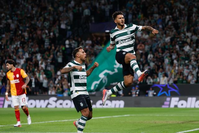 Sporting Lisbon's Colombian forward #97 Luis Suarez (R) celebrates scoring his team's second goal during the UEFA Champions League first round day 1 football match between Sporting CP and Galatasaray at Jose Alvalade stadium in Lisbon on September 9, 2026. (Photo by FILIPE AMORIM / AFP)