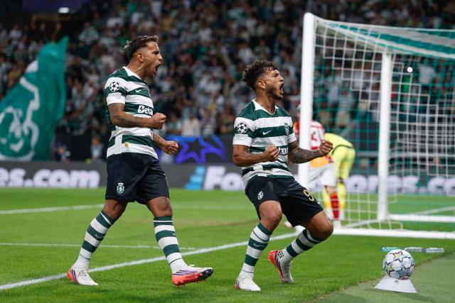 Sporting Lisbon's Colombian forward #97 Luis Suarez (R) celebrates scoring his team's second goal during the UEFA Champions League first round day 1 football match between Sporting CP and Galatasaray at Jose Alvalade stadium in Lisbon on September 9, 2026. (Photo by FILIPE AMORIM / AFP)