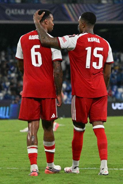 Arsenal's Brazilian defender #06 Gabriel and Arsenal's English defender #15 Ezri Konsa celebrate after winning the UEFA Champions League - League Phase, Matchday 1 - football match between Napoli and Arsenal at the Stadio Diego Armando Maradona in Naples on September 9, 2026. (Photo by Andreas SOLARO / AFP)