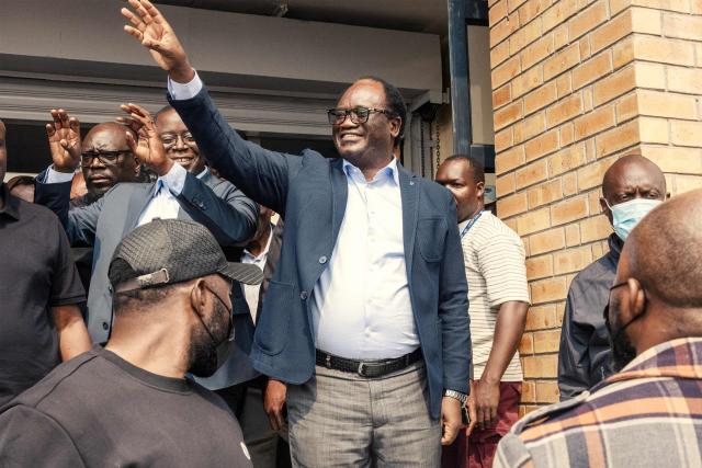 (FILES) National Reconciliation Party for Unity and Prosperity (NRPUP) presidential candidate Brian Muntayalwa Mundubile waves at supporters as he leaves Hot FM radio station studios in Lusaka, on August 12, 2026. The arrest of Zambia's main opposition leader Brian Mundubile and claims of irregularities, violence and an uneven playing field around the August election have intensified concerns that the country is drifting toward the democratic backsliding seen elsewhere on the continent. (Photo by GIANLUIGI GUERCIA / AFP)