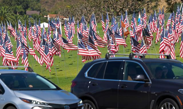 Drivers on the Pacific Coast Highway pass Pepperdine University's annual Wave of Flags display in Malibu, California on September 9, 2026 commemorating the September 11, 2001 attacks. (Photo by Frederic J. BROWN / AFP)