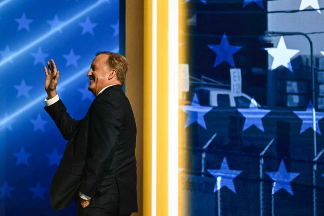 Texas Attorney General Ken Paxton, candidate for US Senate, waves after speaking during the Republican National Midterm Convention at the American Airlines Center in Dallas, Texas on September 9, 2026. US Republicans open an extraordinary midterm convention in Dallas on September 9 betting that putting Donald Trump at the center of their campaign can rescue a party facing grim election forecasts -- despite the president's negative approval ratings. (Photo by Kent NISHIMURA / AFP)