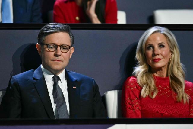 (L/R) US Speaker of the House Mike Johnson sits with his wife Kelly Johnson during the Republican National Midterm Convention at the American Airlines Center in Dallas, Texas on September 9, 2026. US Republicans open an extraordinary midterm convention in Dallas on September 9 betting that putting Donald Trump at the center of their campaign can rescue a party facing grim election forecasts -- despite the president's negative approval ratings. (Photo by Kent NISHIMURA / AFP)