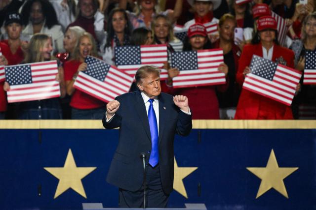 US President Donald Trump dances at the conclusion of his remarks during the Republican National Midterm Convention at the American Airlines Center in Dallas, Texas on September 9, 2026. US Republicans open an extraordinary midterm convention in Dallas on September 9 betting that putting Donald Trump at the center of their campaign can rescue a party facing grim election forecasts -- despite the president's negative approval ratings. (Photo by Patrick T. Fallon / AFP)
