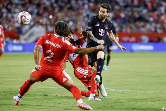 Inter Miami's Argentine forward #10 Lionel Messi shoots between Chicago Fire's US midfielder #35 Sergio Oregel Jr. (C) and Chicago Fire's Portuguese defender #02 Leonardo Barroso during a Major League Soccer (MLS) regular season football match between Inter Miami CF and Chicago Fire FC at Soldier Field in Chicago, Illinois, on September 9, 2026. (Photo by KAMIL KRZACZYNSKI / AFP)