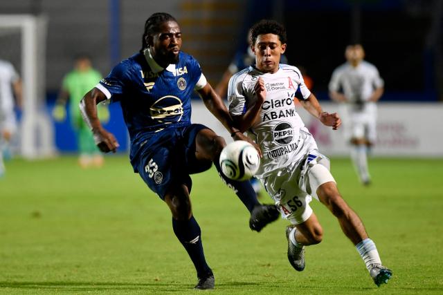 Motagua's defender #35 Cristopher Melendez and Alianza's midfielder #56 David Leon fight for the ball during the first-leg quarterfinal football match of the Concacaf Central American Cup between Honduras' Motagua and El Salvador's Alianza FC at the Chelato Ucles National Stadium in Tegucigalpa on September 9, 2026. (Photo by Orlando SIERRA / AFP)
